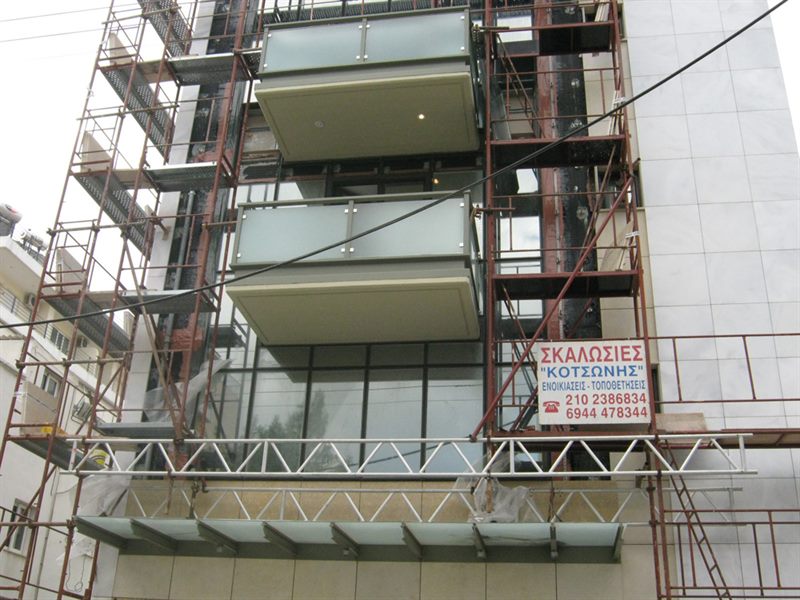 Scaffolding for balcony repairs on an apartment building