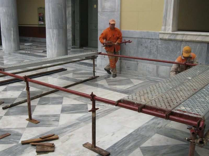 Interior work platform in a marble hall