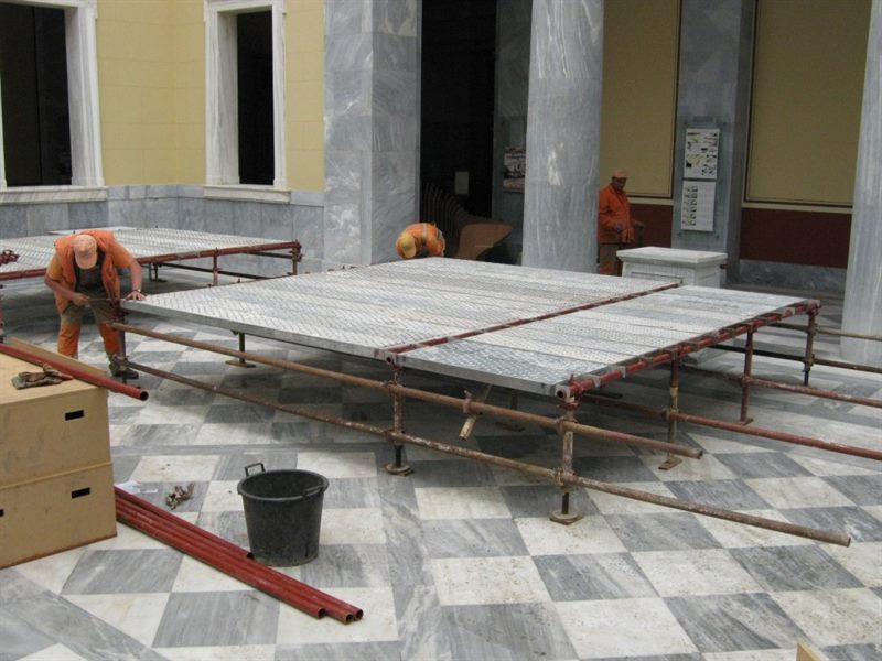 Interior work platform in a marble hall