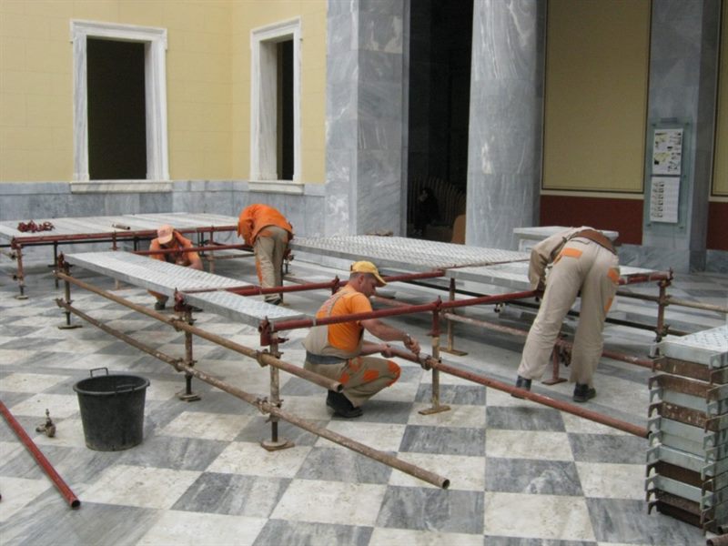 Interior work platform in a marble hall