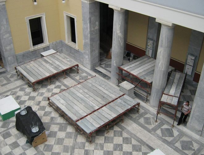 Interior work platform in a marble hall