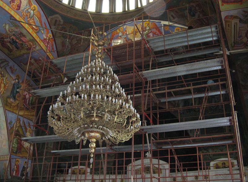 Scaffolding around a church chandelier