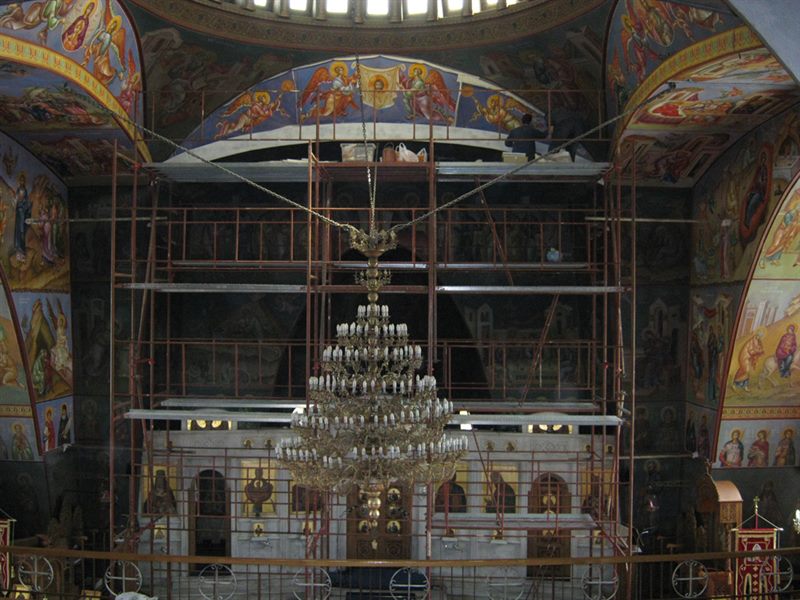 Scaffolding in front of a church iconostasis