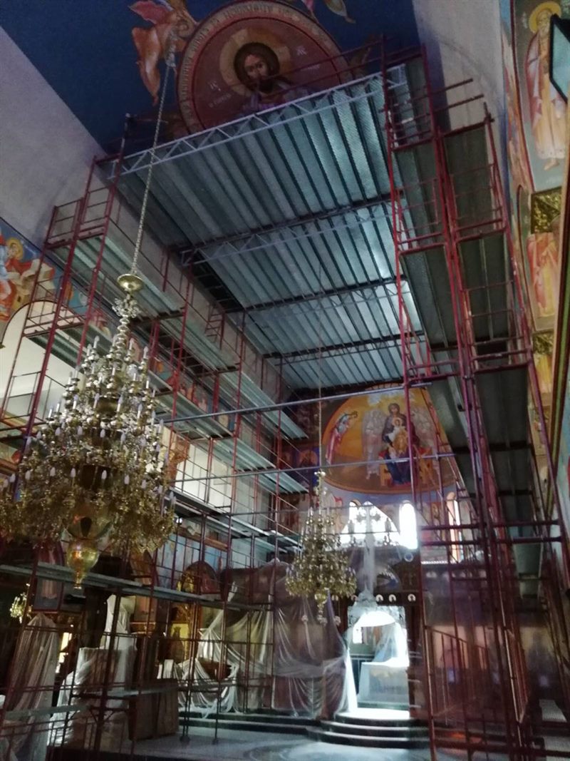 Scaffolding around a church chandelier