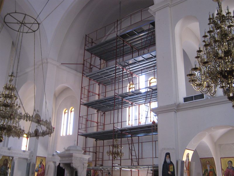 Scaffolding around a church chandelier