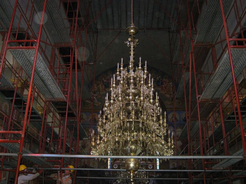 Scaffolding around a church chandelier