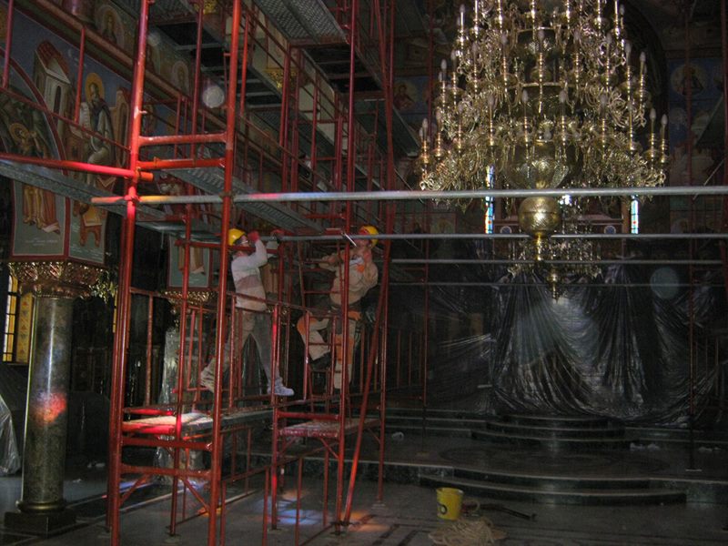 Scaffolding around a church chandelier
