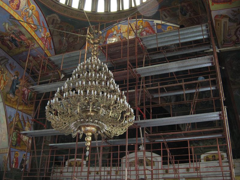 Scaffolding around a church chandelier