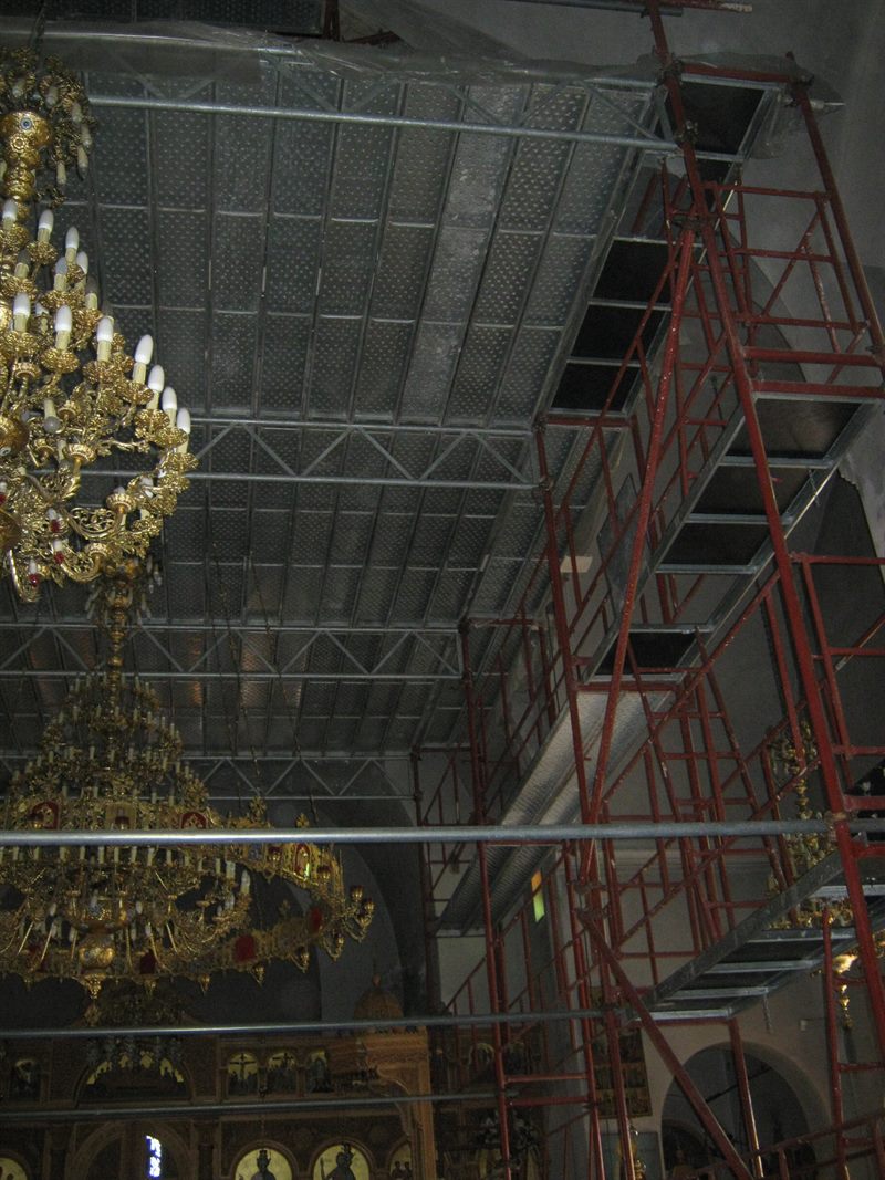 Scaffolding around a church chandelier