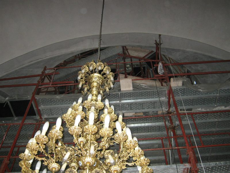 Scaffolding around a church chandelier