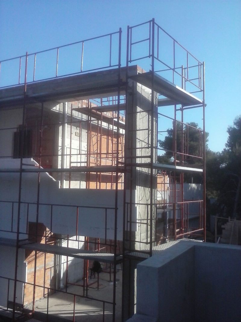 Scaffolding on a building frame under construction