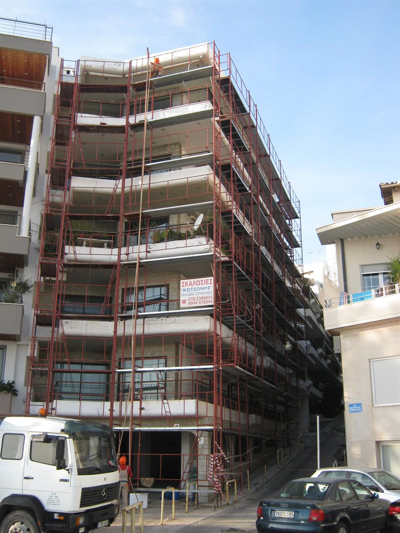 Scaffolding for balcony repairs on an apartment building