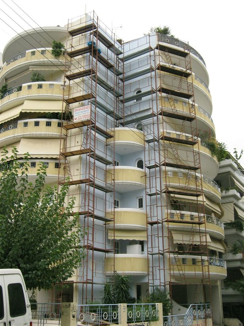 Scaffolding for balcony repairs on an apartment building