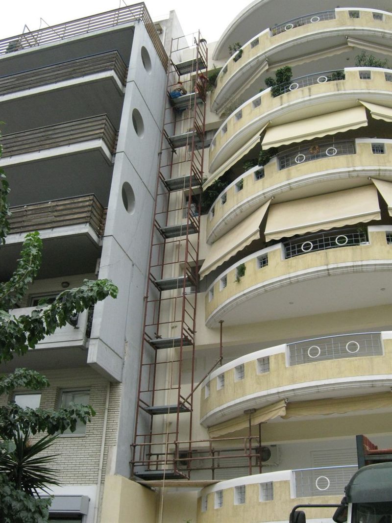 Scaffolding for balcony repairs on an apartment building