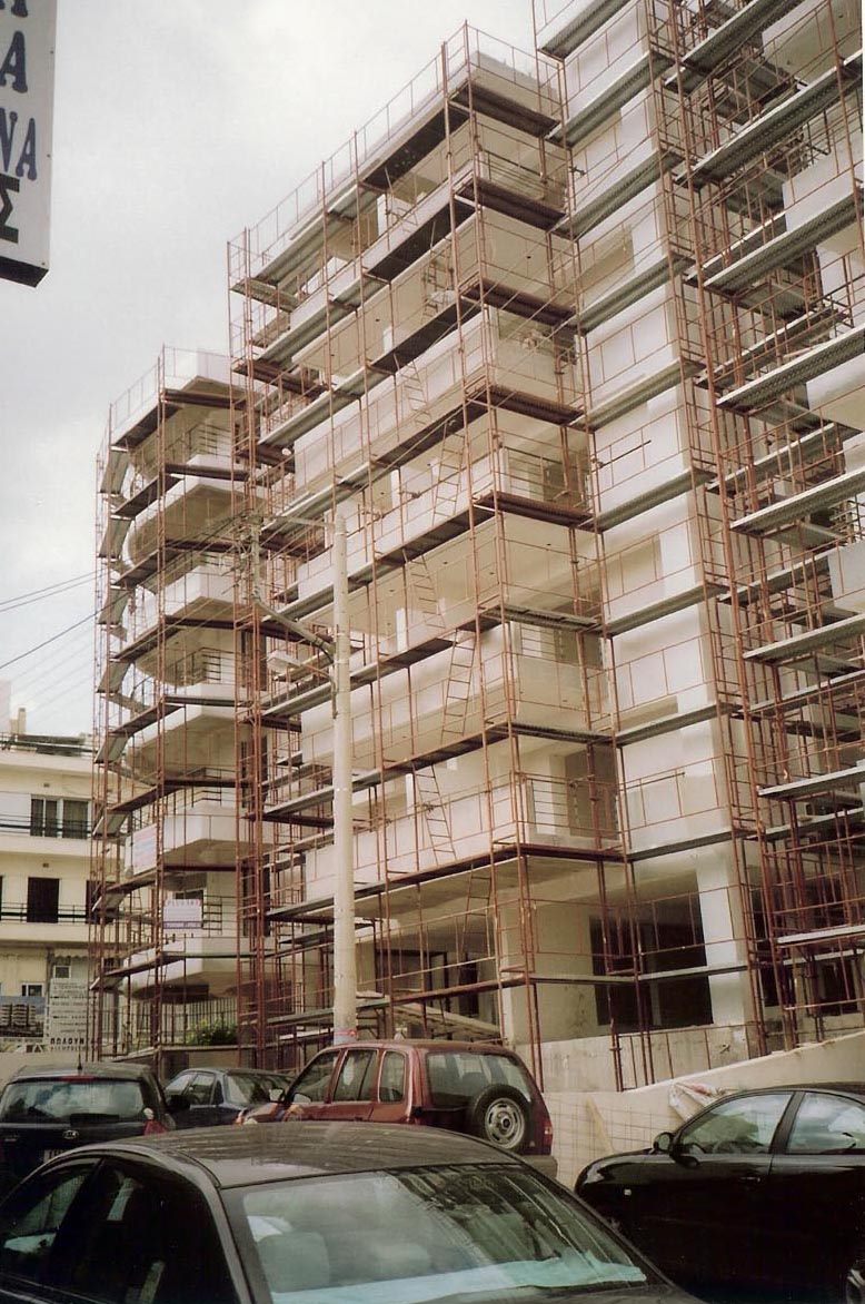 Scaffolding for balcony repairs on an apartment building