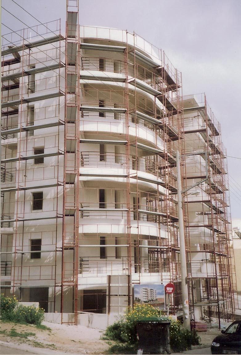 Scaffolding for balcony repairs on an apartment building