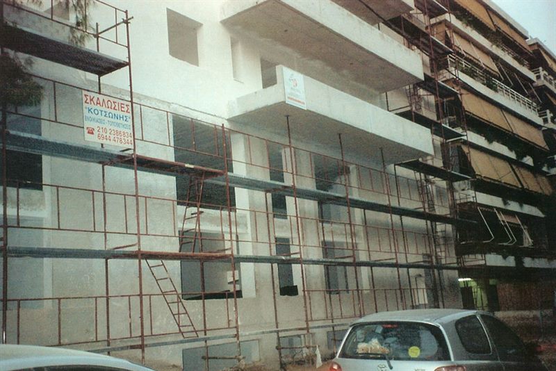 Scaffolding for balcony repairs on an apartment building