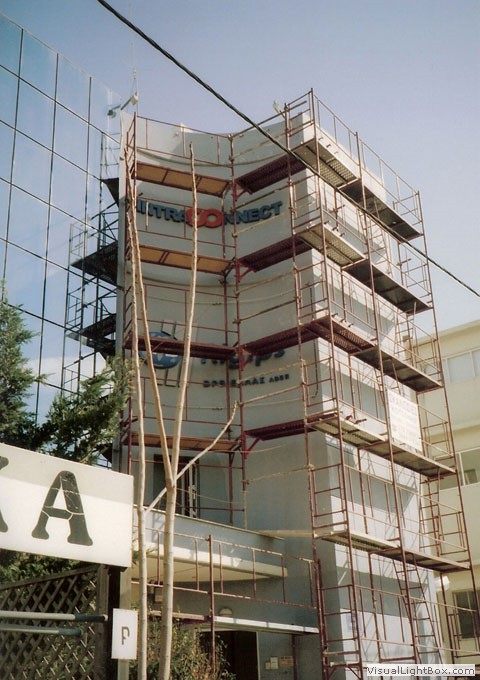 Scaffolding for balcony repairs on an apartment building
