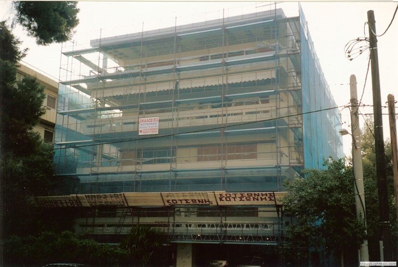 Scaffolding for balcony repairs on an apartment building