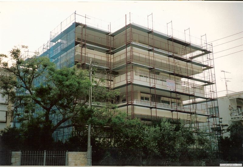 Scaffolding for balcony repairs on an apartment building