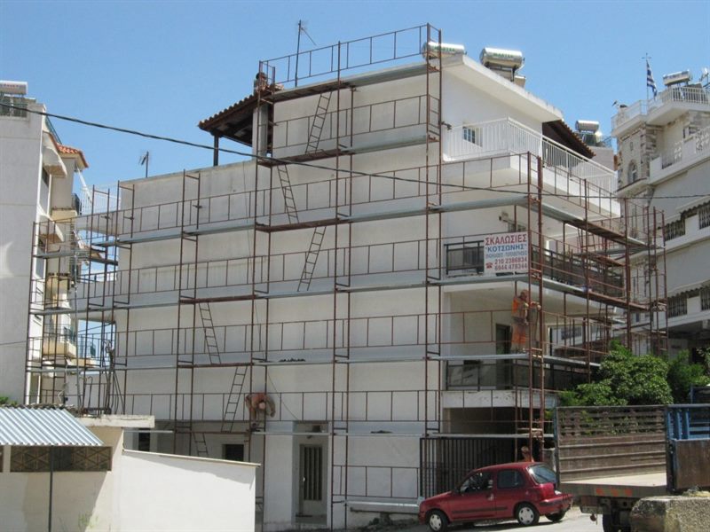 Scaffolding for facade painting in Kamatero