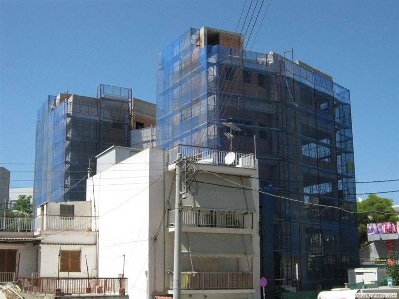 Scaffolding with blue safety netting on an apartment building