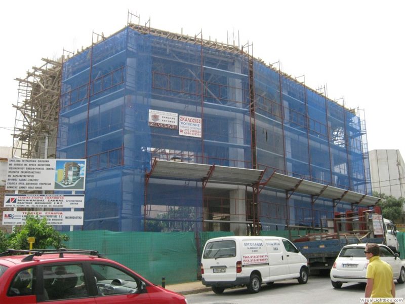Scaffolding with blue safety netting on an apartment building